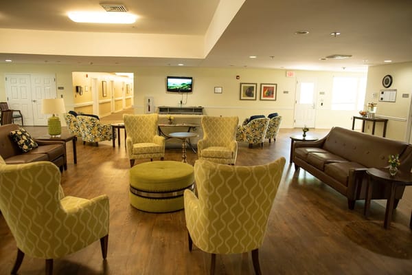 Comfortable lounge seating with a television in a common area