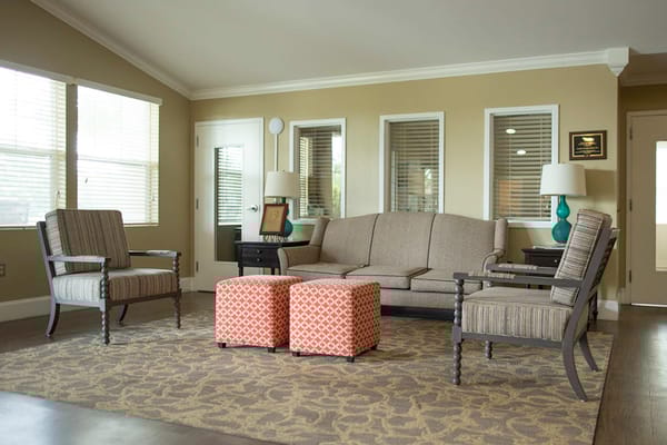 Comfortable living room with a sofa and armchairs