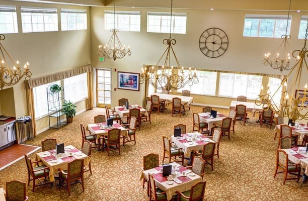 Bright dining area with elegant decor and tables