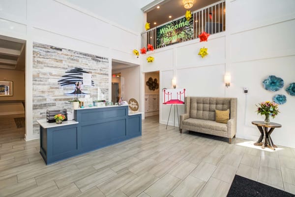 Spacious lobby with modern decor and seating area