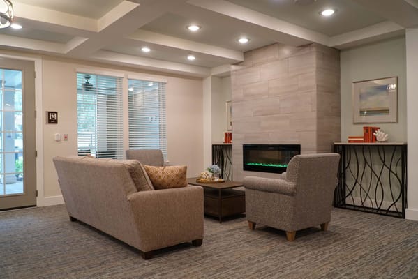 Cozy common area with seating and fireplace