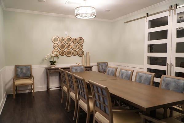 Interior of a common area with dining table and chairs