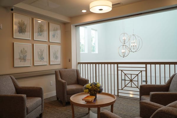 Comfortable seating area with decorative artwork