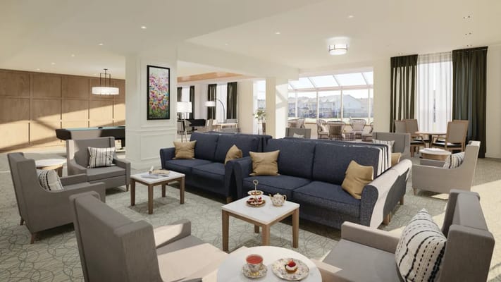 Bright common area with seating and snacks