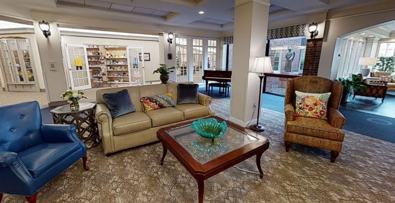 Common area with comfortable seating and a piano
