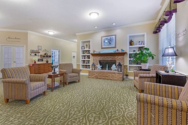 Cozy common area with seating and a fireplace