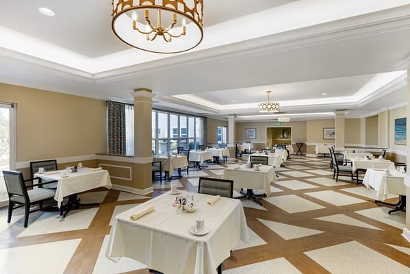 Bright dining room with neatly arranged tables