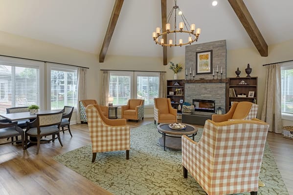 Bright common area with seating and natural light