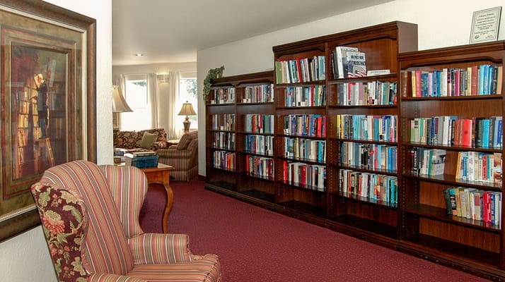 Cozy reading nook with bookshelves and comfortable seating