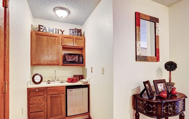 Interior view of a kitchenette area in a resident's suite