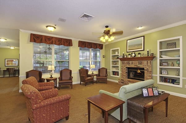 Cozy common area with comfortable seating and a fireplace