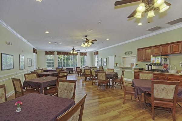 Bright dining room with tables and chairs