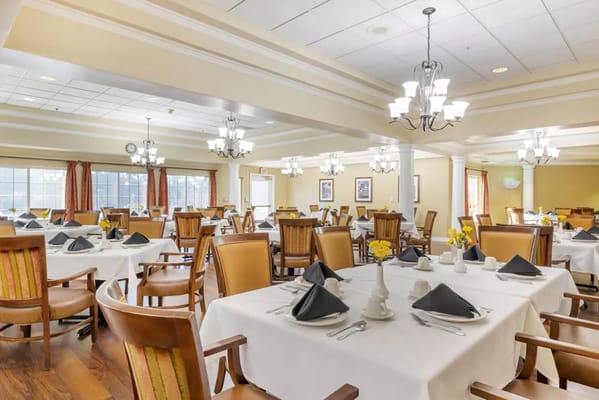 Bright dining room with neatly set tables