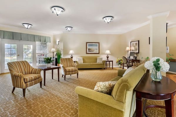 A cozy common area with seating and decorations