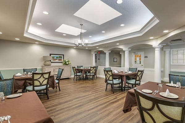 Dining area with tables set for a meal