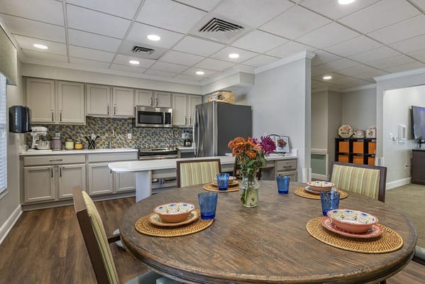 Cozy dining area with table set for a meal