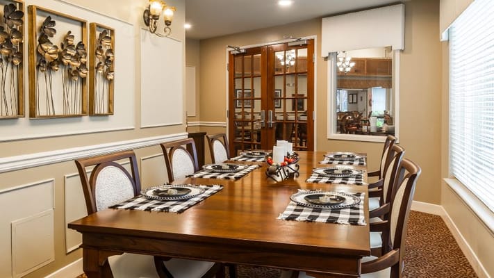 Elegant dining room with decorated table settings