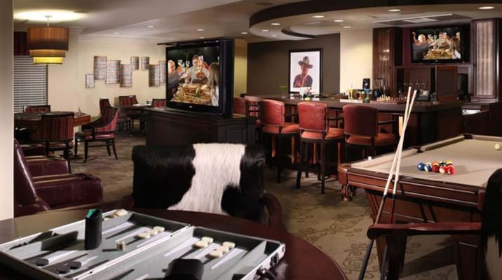 Interior common area with pool table and bar.