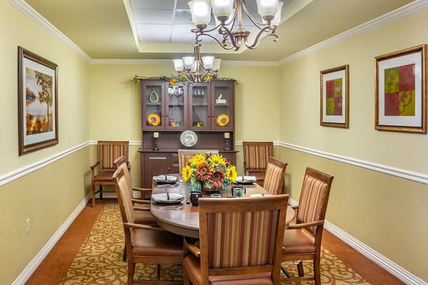 Interior dining room with a set table and decorations