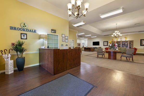 Bright interior lobby with flowers and seating