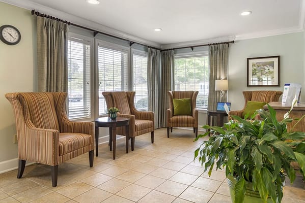 Cozy lounge area with comfortable seating and natural light