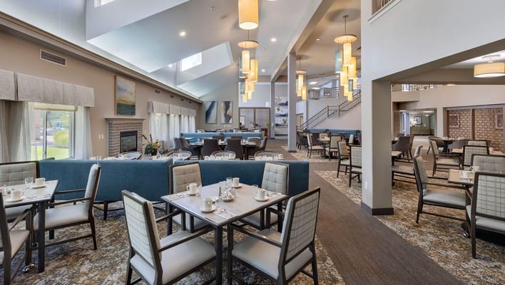 Dining room with tables set for residents