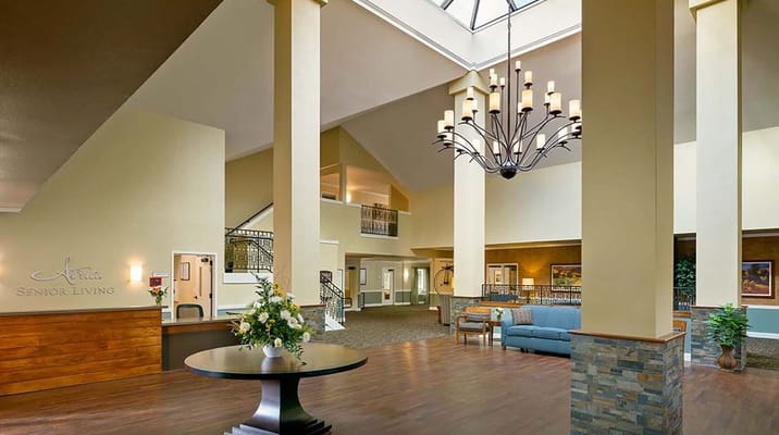 Bright and spacious lobby area of a senior living facility