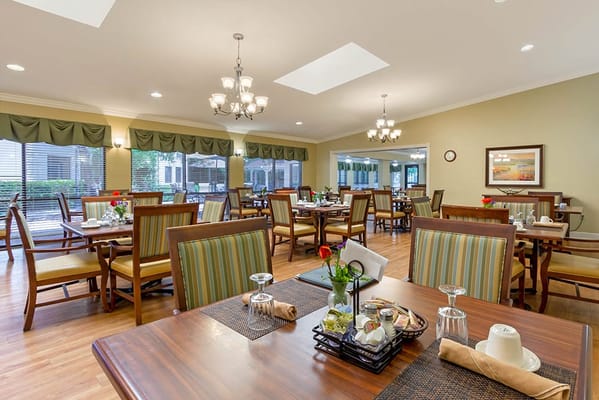 Dining area with tables set for a meal