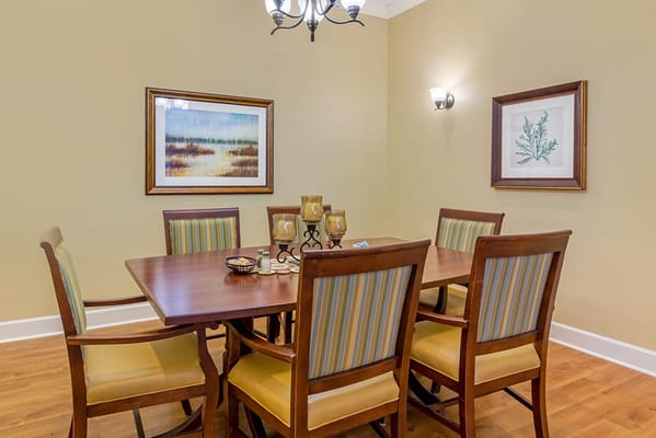 Dining area with a wooden table and chairs