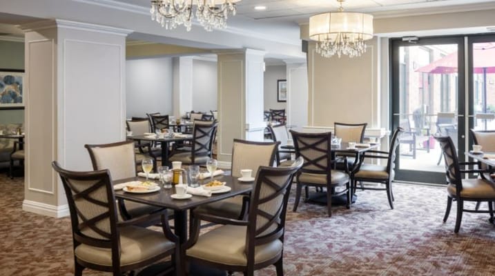 Dining room with tables set for breakfast