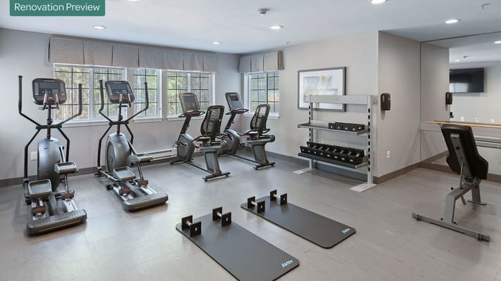 Modern gym with exercise equipment at Holiday Washington Commons