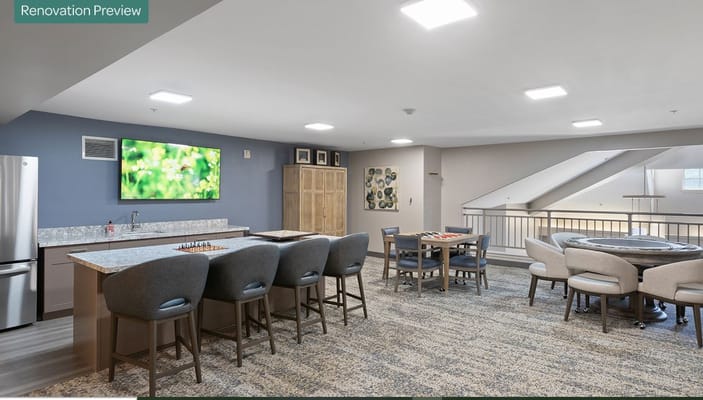 Bright and modern game room with seating and a television.