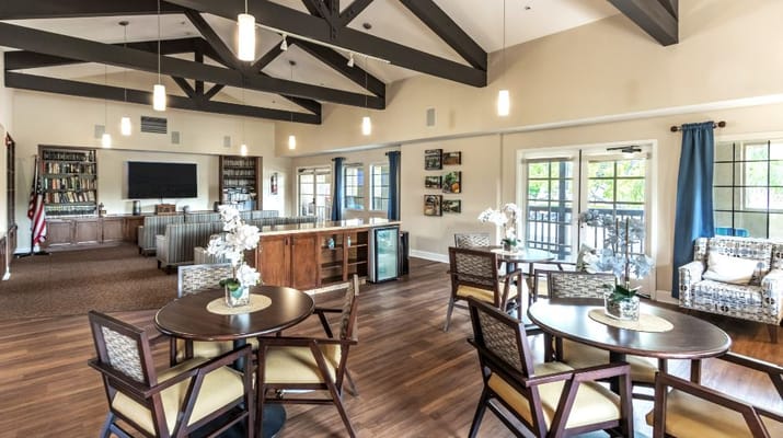 Interior common area with seating and bookshelves