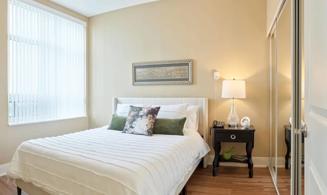 Bright and inviting bedroom in assisted living facility