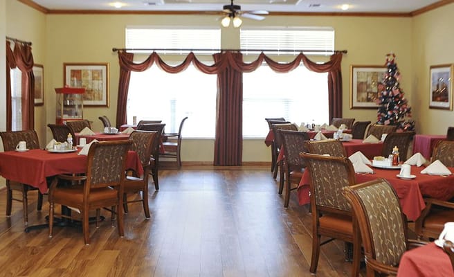Dining area with tables set for a meal