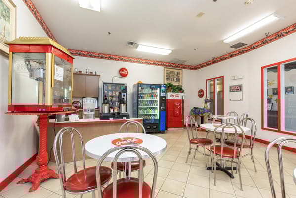 Cozy café area with red and white themed seating
