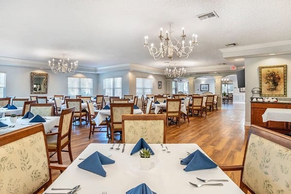 Dining area with tables set for a meal