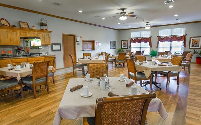 Dining area with tables set for a meal