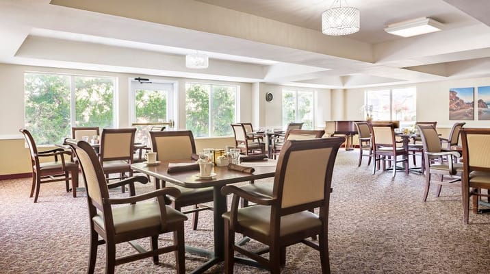 Bright dining room with tables and chairs