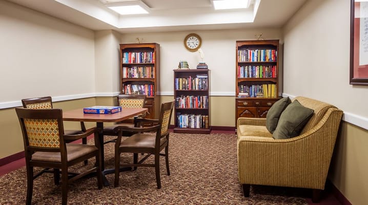 Interior common area with bookshelves and seating