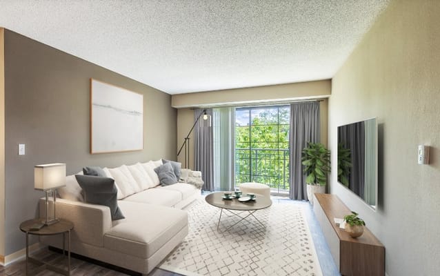 Cozy living room with a view of greenery
