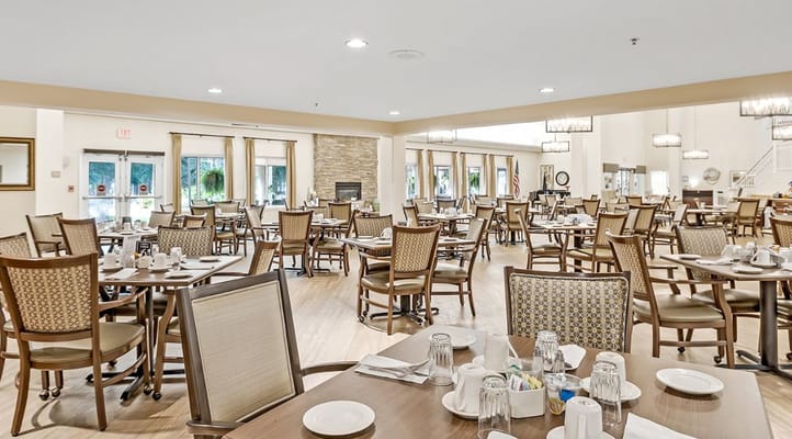 Dining area set with tables and chairs