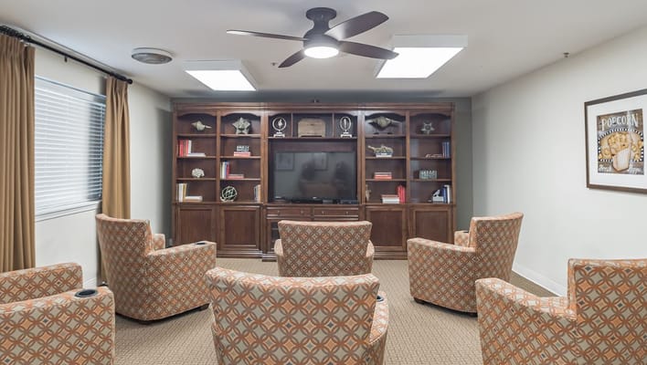 Cozy common area with comfortable seating and TV