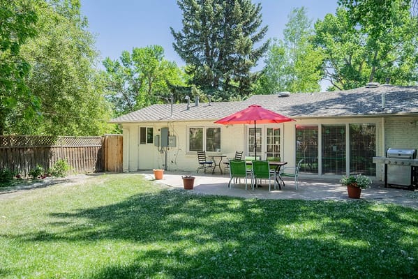 Outdoor seating area with garden and patio