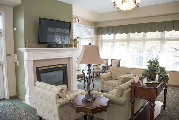 Cozy common area with seating and fireplace