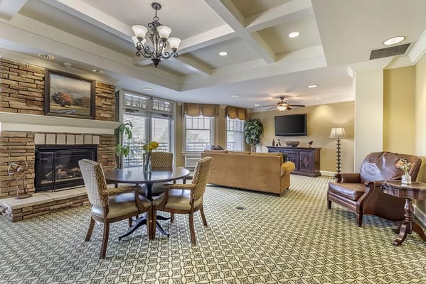 Common area with comfortable seating and a fireplace