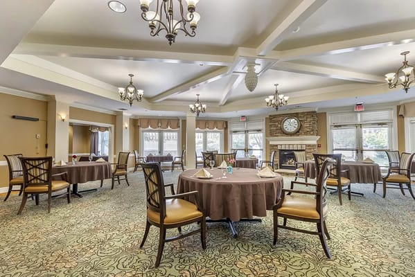 Elegant dining room setup with tables and chairs