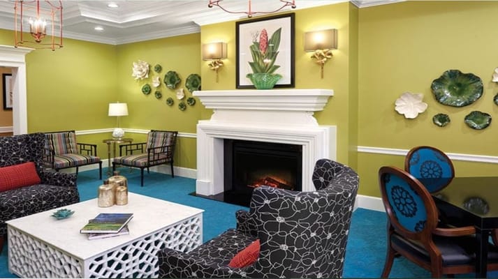 Welcoming living room with a fireplace and colorful decor