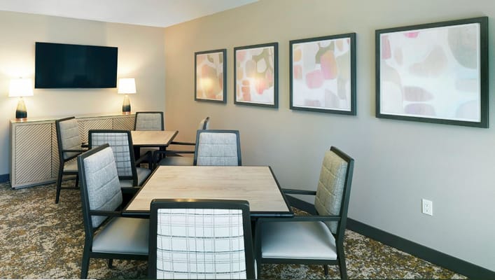 Bright and modern dining area with artwork