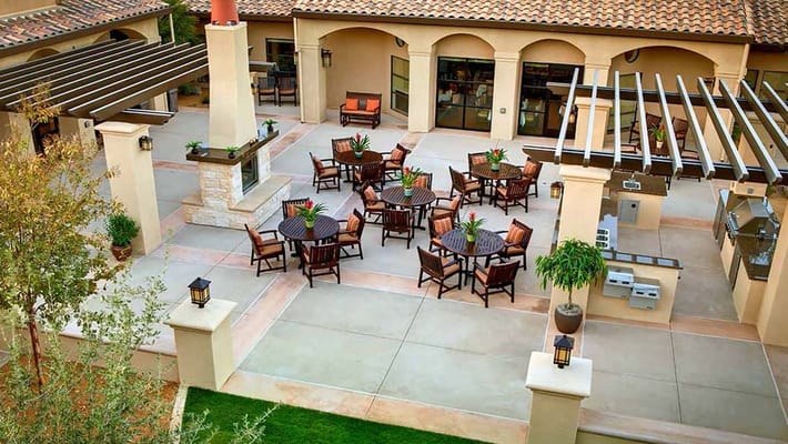 Aerial view of a patio area with tables and chairs